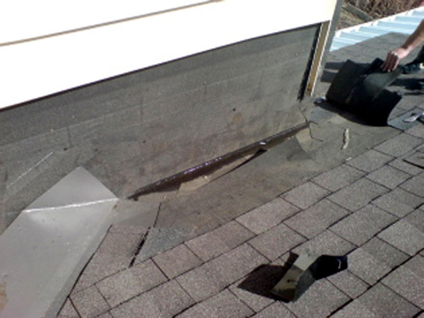 Dead Valley - A dead valley will cause a leaky roof, water stains on your ceiling, and/or considerable ice build up. If you suspect you have a dead valley, contact Bricor Roofing today!